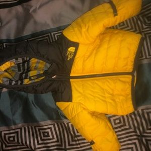 Infant reversible The North Face jacket